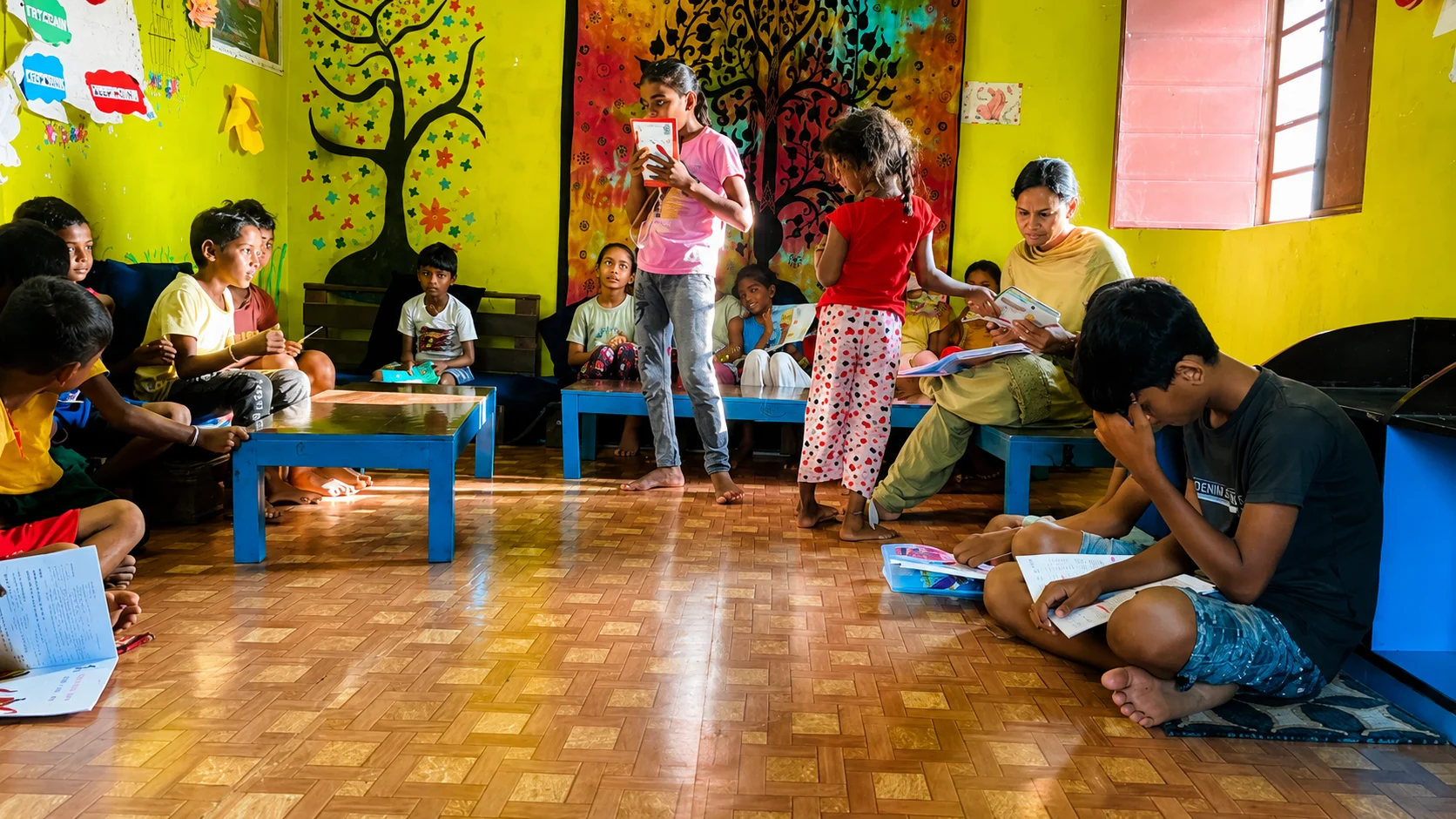 Inspiring a love of learning Children reading and playing in a colourful library