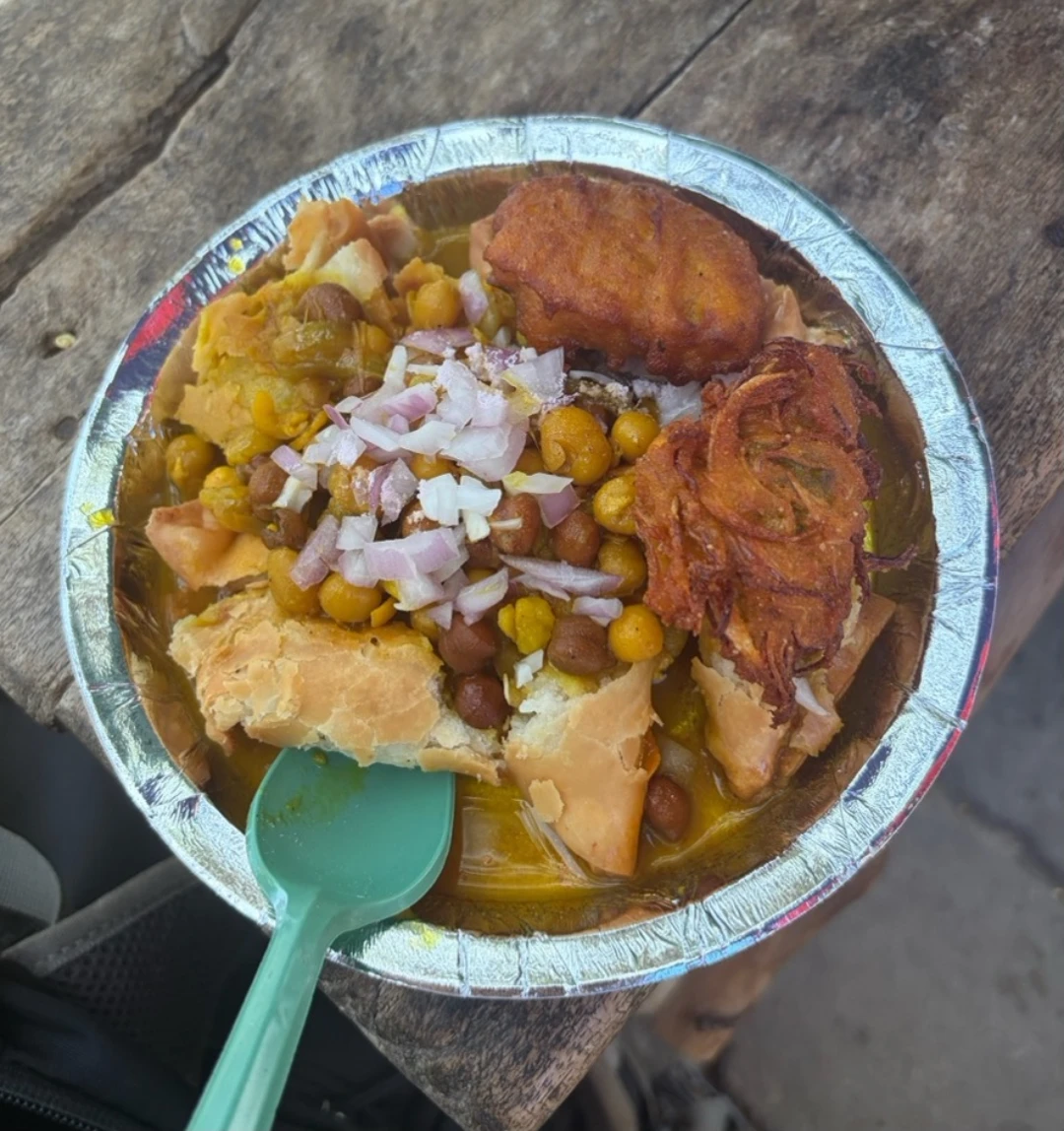 Bowl of Nepali street food served with a spoon